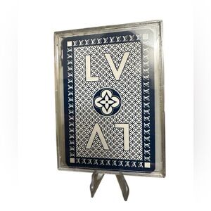 Authentic Louis Vuitton playing card Clover 3 in a display case New